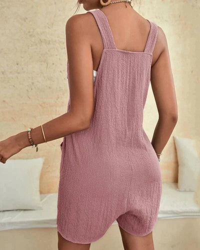 Brixie | Festlig jumpsuit for kvinner med vide ben, dypt snitt og praktiske lommer